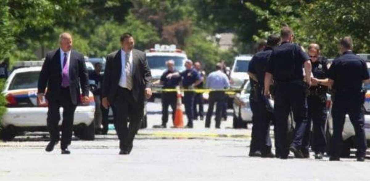 owner, partner, and other law enforcement professionals at a crime scene